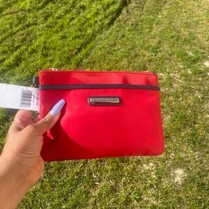 - TOMMY HILFIGER red wristlet , NWT​​